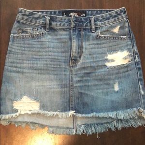 Distressed blue jean skirt
